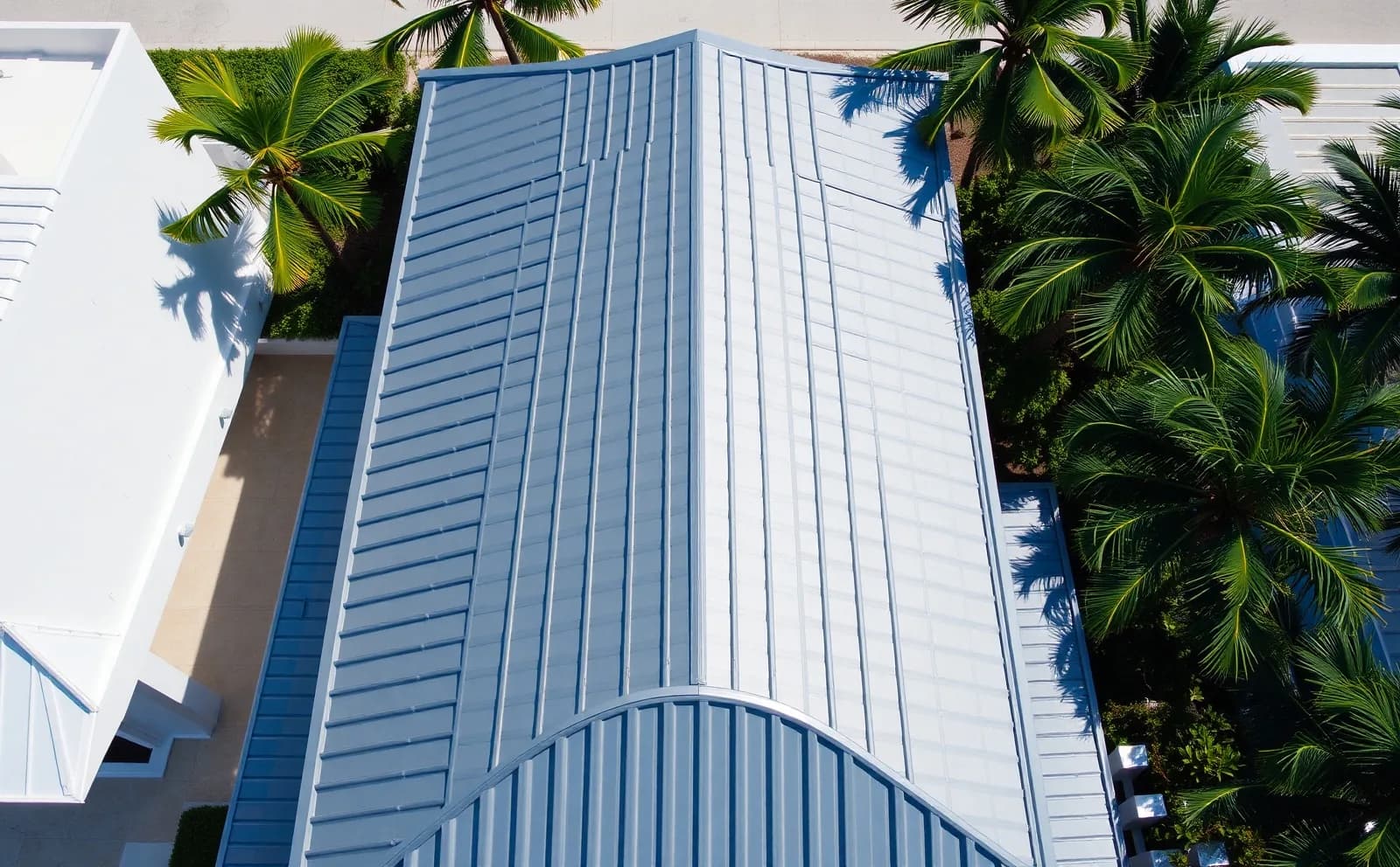 Standing-seam metal roofing with coastal-grade coatings installed on a Belle Isle residence — engineered for salt air, UV exposure, and HVHZ wind loads. Roofing Services in Miami Beach, FL — mid 2 photo by Haven in Miami Beach, FL